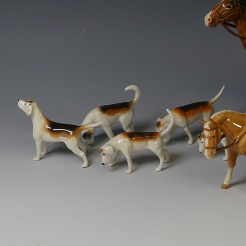 69 - A Beswick pottery Hunting Group, to include four Riders, one on Rearing Horse, one with Black Coat, ... 