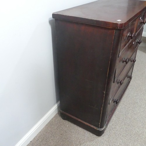 488 - A Victorian mahogany chest of drawers, two short over three long, on bun feet, damage to veneer, W 9... 