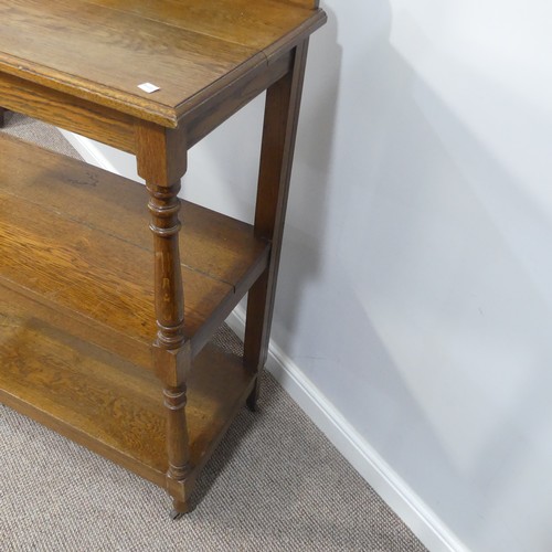 489 - An Edwardian oak three-tier serving Buffet, with turned supports, W 100cm x D 44cm x H 122cm.... 