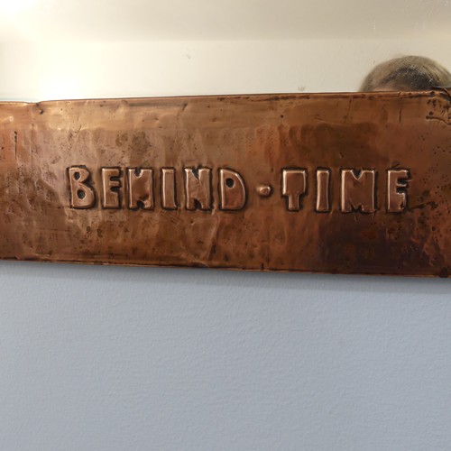 491 - An Arts and Crafts copper framed rectangular Wall Mirror, hammered and riveted surround with motto '... 