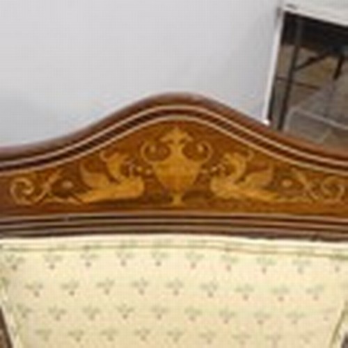 306 - An Edwardian mahogany framed two-seater Ladies Settee, the shaped top rail inlaid with classical urn... 