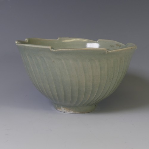 74 - A Leach studio pottery small lobed Bowl, in off-white glaze, with impressed mark near foot, together... 