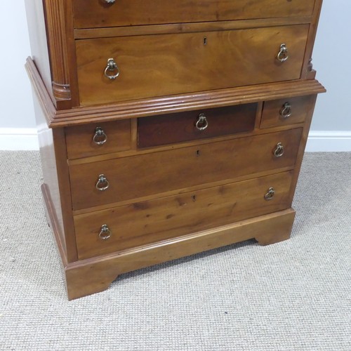 494 - A Georgian style hardwood Chest on Chest, of typical form in two parts with twelve drawers, damage t... 