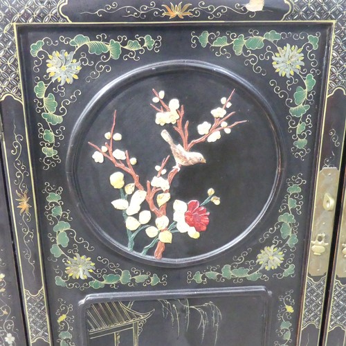 495 - An Oriental Shibayama-style black lacquered Side Cabinet, in the Japanese manner, the twin panelled ... 