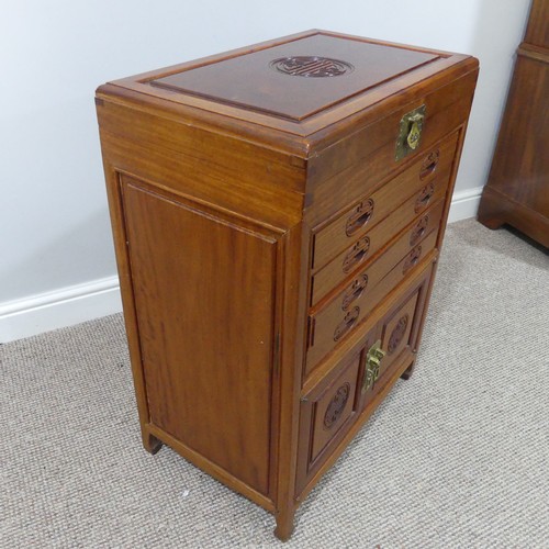 307 - An Oriental hardwood Cutlery Canteen Cabinet, with baize lined fitted hinged top section above four ... 