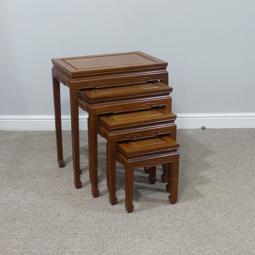 311 - A suite of Oriental hardwood furniture, to include a chest of drawers, a nest of four Tables, W 55cm... 