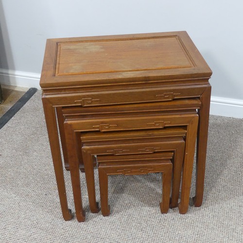 311 - A suite of Oriental hardwood furniture, to include a chest of drawers, a nest of four Tables, W 55cm... 