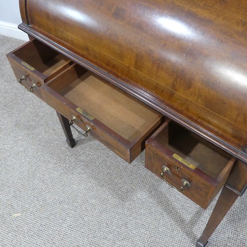 498 - An Edwardian inlaid mahogany roll-top Bureau, having a three drawer section top over roll top openin... 