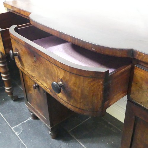 516 - A Georgian mahogany pedestal Sideboard, the shaped top above three frieze drawers and two cupboards,... 