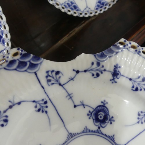 87 - An extensive Royal Copenhagen blue and white fluted lace pattern Dinner Service, comprising twelve P... 