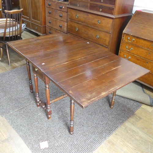 540 - A Georgian mahogany drop-leaf Table, with double frieze drawer, raised on turned legs, one leg broke... 