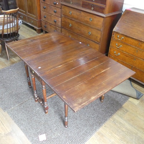 540 - A Georgian mahogany drop-leaf Table, with double frieze drawer, raised on turned legs, one leg broke... 