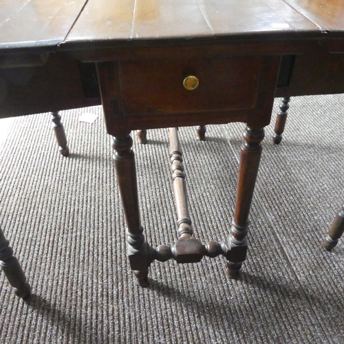 540 - A Georgian mahogany drop-leaf Table, with double frieze drawer, raised on turned legs, one leg broke... 