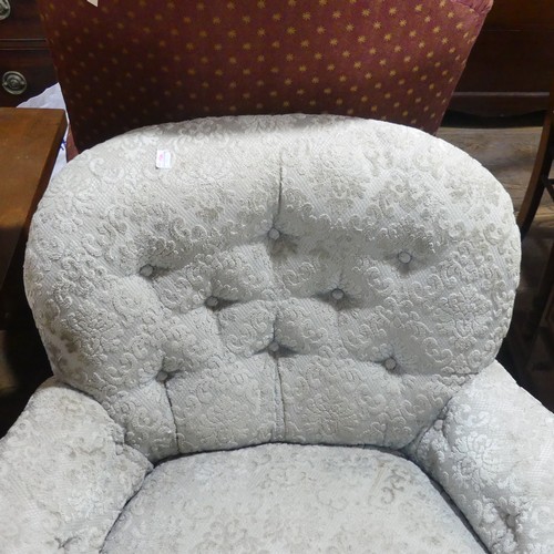 523 - A Victorian upholstered Armchair, with turned feet and castors, fading to fabric, W 82cm x D 84cm x ... 