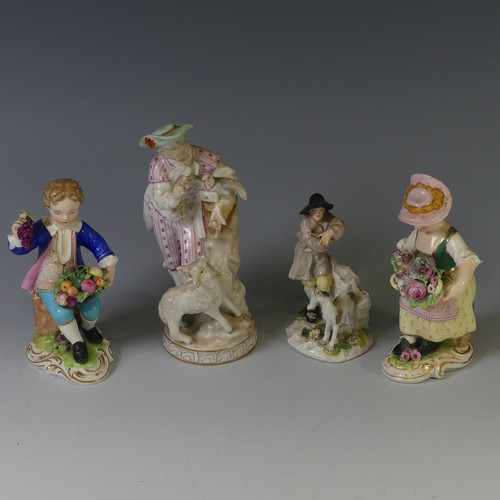 113 - A 19thC continental porcelain figure of a Shepherd, after a Meissen figure, holding a dove and love ... 