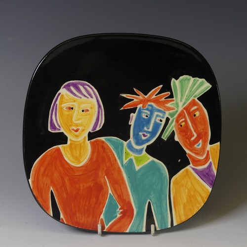 114 - A Jane Willingale for Honiton Pottery loudware Wall Plate, depicting three colourfully painted figur... 