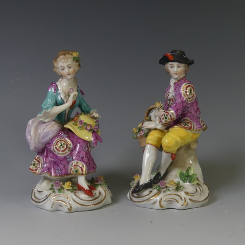 115 - A pair of Sampson porcelain Figures, depicted perched upon tree stumps, raised on gilded plinth base... 