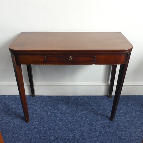 301 - A Georgian mahogany demi-lune Card Table, with fold over top and gateleg action, some damage and rep... 