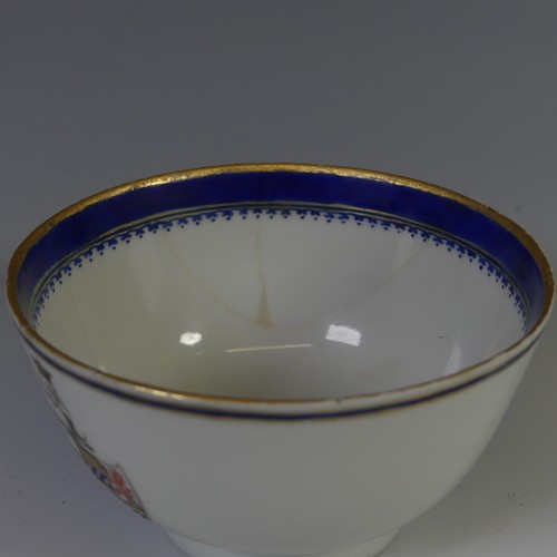 144 - An 18thC Chinese export armorial porcelain Teabowl and Saucer, decorated with gilt and blue banding ... 