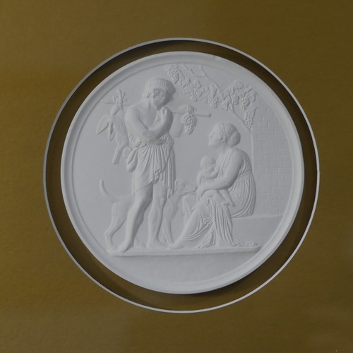 447 - A set of four plaster 'Grand Tour' style circular Plaques, each depicting a different classical scen... 