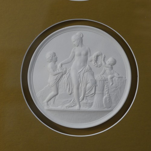 447 - A set of four plaster 'Grand Tour' style circular Plaques, each depicting a different classical scen... 