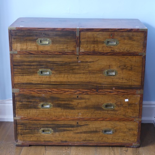 521 - A 19thC brass-mounted mahogany military Campaign Chest, in two parts, with two short above three lon... 