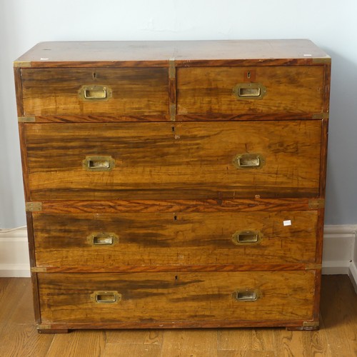 521 - A 19thC brass-mounted mahogany military Campaign Chest, in two parts, with two short above three lon... 