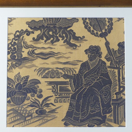 129 - A Chinese woven silk Panel, depicting an elder on a throne among clouds, overmounted, framed in a wa... 