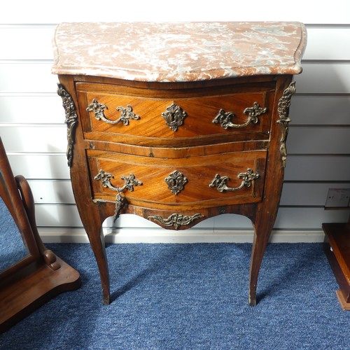 324 - An early 20thC French kingwood bombe Commode, the marble top upon two crossbanded drawers, all fitte... 