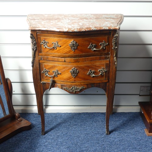 324 - An early 20thC French kingwood bombe Commode, the marble top upon two crossbanded drawers, all fitte... 