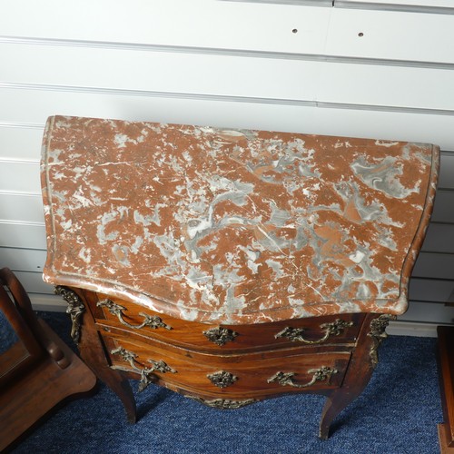 324 - An early 20thC French kingwood bombe Commode, the marble top upon two crossbanded drawers, all fitte... 