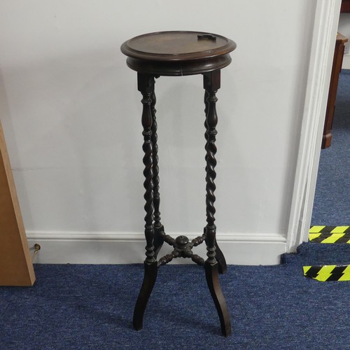 317 - An Edwardian barley-twist Torchere Plant Stand, circular top on barley twist supports connected by a... 