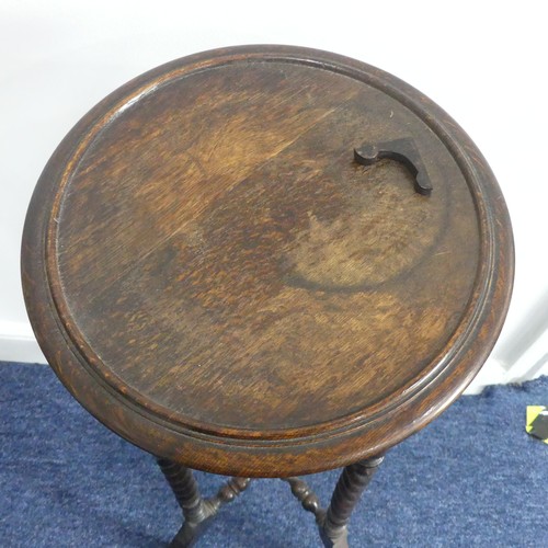 317 - An Edwardian barley-twist Torchere Plant Stand, circular top on barley twist supports connected by a... 