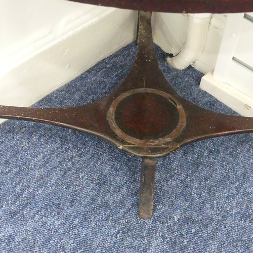 321 - A Georgian mahogany corner Washstand, with one drawer and two dummy drawers, raised on splayed legs,... 