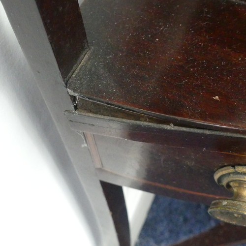 321 - A Georgian mahogany corner Washstand, with one drawer and two dummy drawers, raised on splayed legs,... 