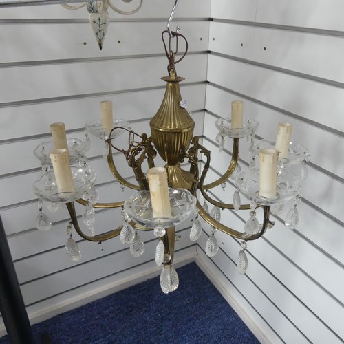 326 - A vintage brass seven branch Chandelier, with crystal drops, 52cm diameter.