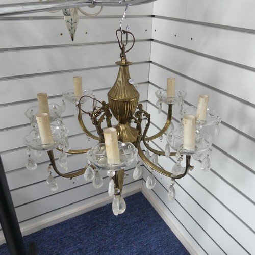 326 - A vintage brass seven branch Chandelier, with crystal drops, 52cm diameter.