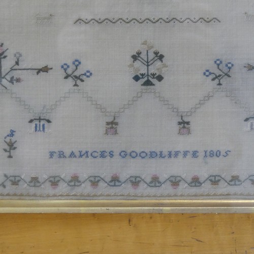 369 - A Georgian sampler, dated 1805, worked with coloured threads with a reflective motto about youth and... 