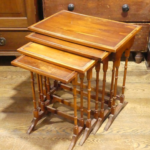 537 - A mahogany Nest of four Tables, raised on moulded legs and sledge feet, the largest: W 59cm x D 38cm... 