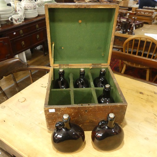 446 - An early 20thC cased set of six glass Bottles, the tops labelled W (2), B (2), R (2), in a fitted wo... 