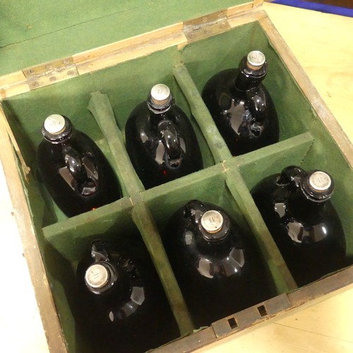 446 - An early 20thC cased set of six glass Bottles, the tops labelled W (2), B (2), R (2), in a fitted wo... 