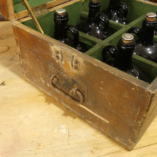 446 - An early 20thC cased set of six glass Bottles, the tops labelled W (2), B (2), R (2), in a fitted wo... 