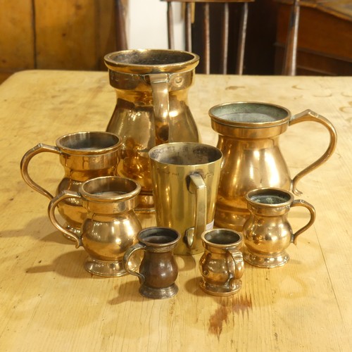 451 - A small quantity of 19thC brass Liquid Standard Measures, most stamped VR, makers including Faulker ... 