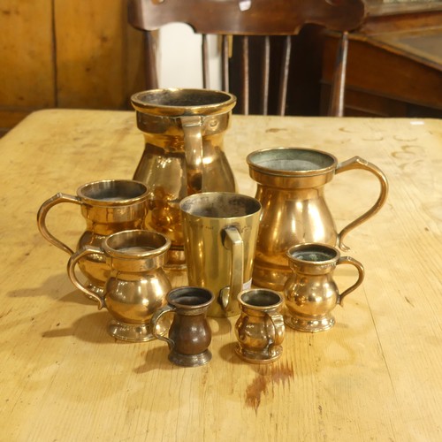 451 - A small quantity of 19thC brass Liquid Standard Measures, most stamped VR, makers including Faulker ... 