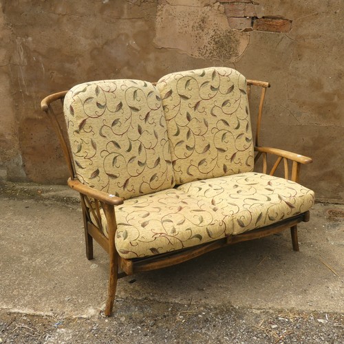 513 - A mid-20thC stick-back Three-Piece Suite, comprising a two seater Sofa and two Armchairs, the sofa W... 