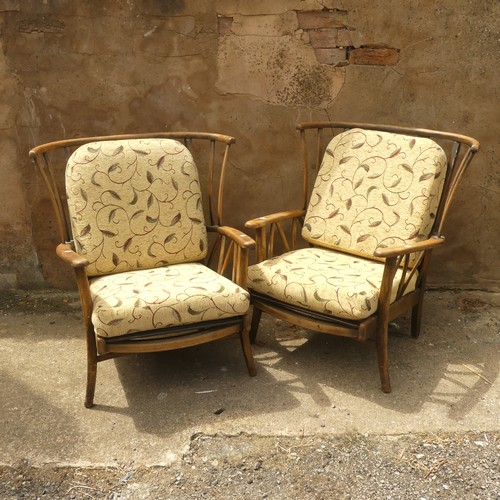 513 - A mid-20thC stick-back Three-Piece Suite, comprising a two seater Sofa and two Armchairs, the sofa W... 