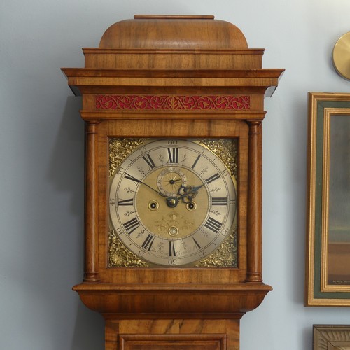 264 - A walnut and feather-banded Longcase Clock, by Thomas Elliott, Greenwich, early 18th century and lat... 