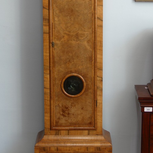 264 - A walnut and feather-banded Longcase Clock, by Thomas Elliott, Greenwich, early 18th century and lat... 