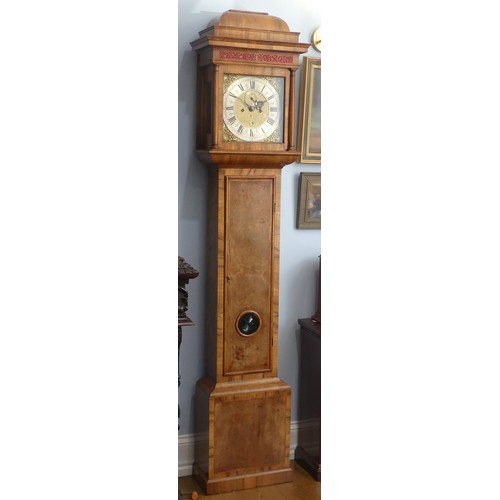 264 - A walnut and feather-banded Longcase Clock, by Thomas Elliott, Greenwich, early 18th century and lat... 