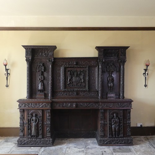 530 - A late 16thC to early 17thC, and later, heavily carved oak large inverted breakfront pedestal Sidebo... 